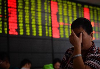 Chinese shares close lower Friday