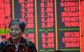 Chinese shares higher at midday Monday