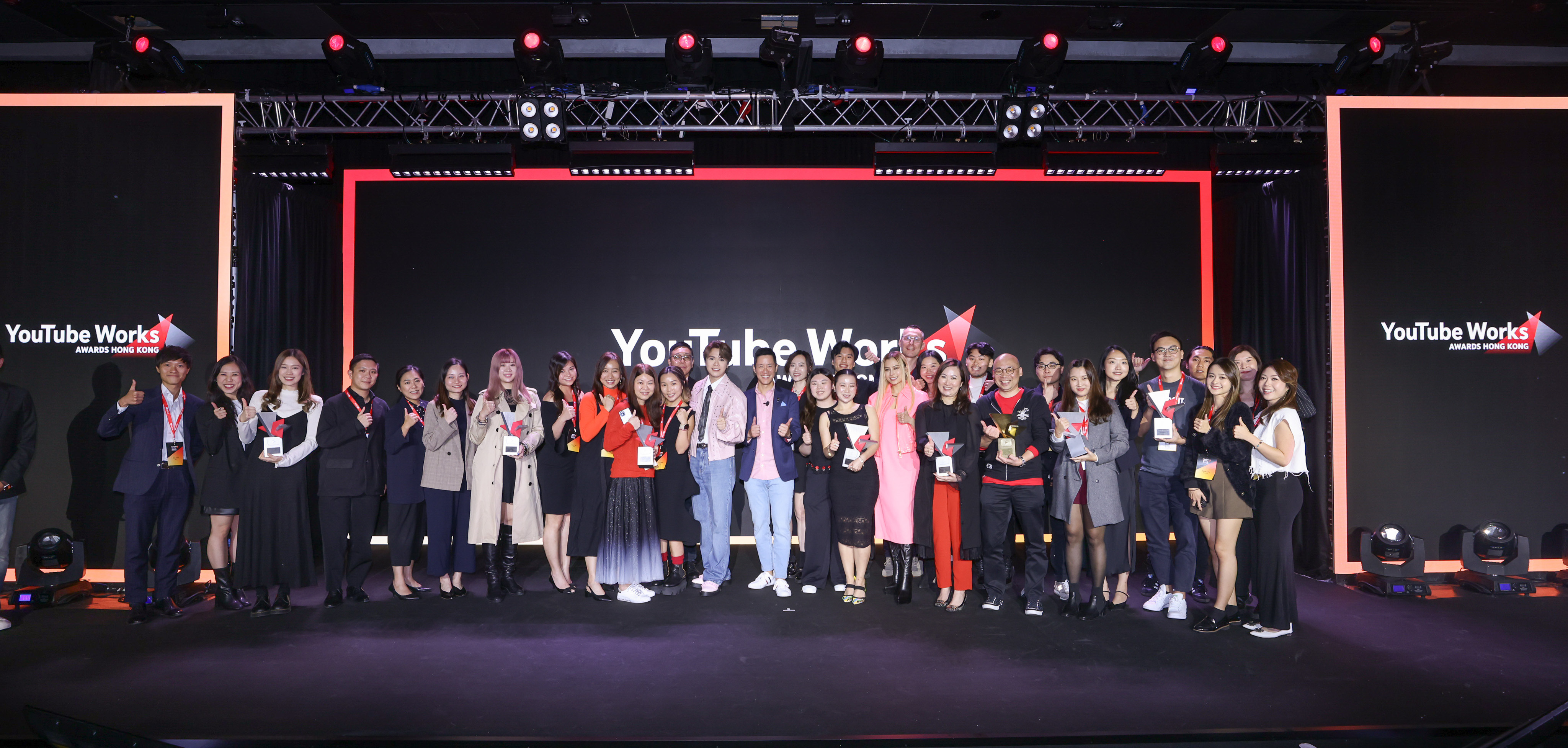 Michael Yue, General Manager, Sales & Operations, Google Hong Kong (middle) with YouTube Works Award winners and creators