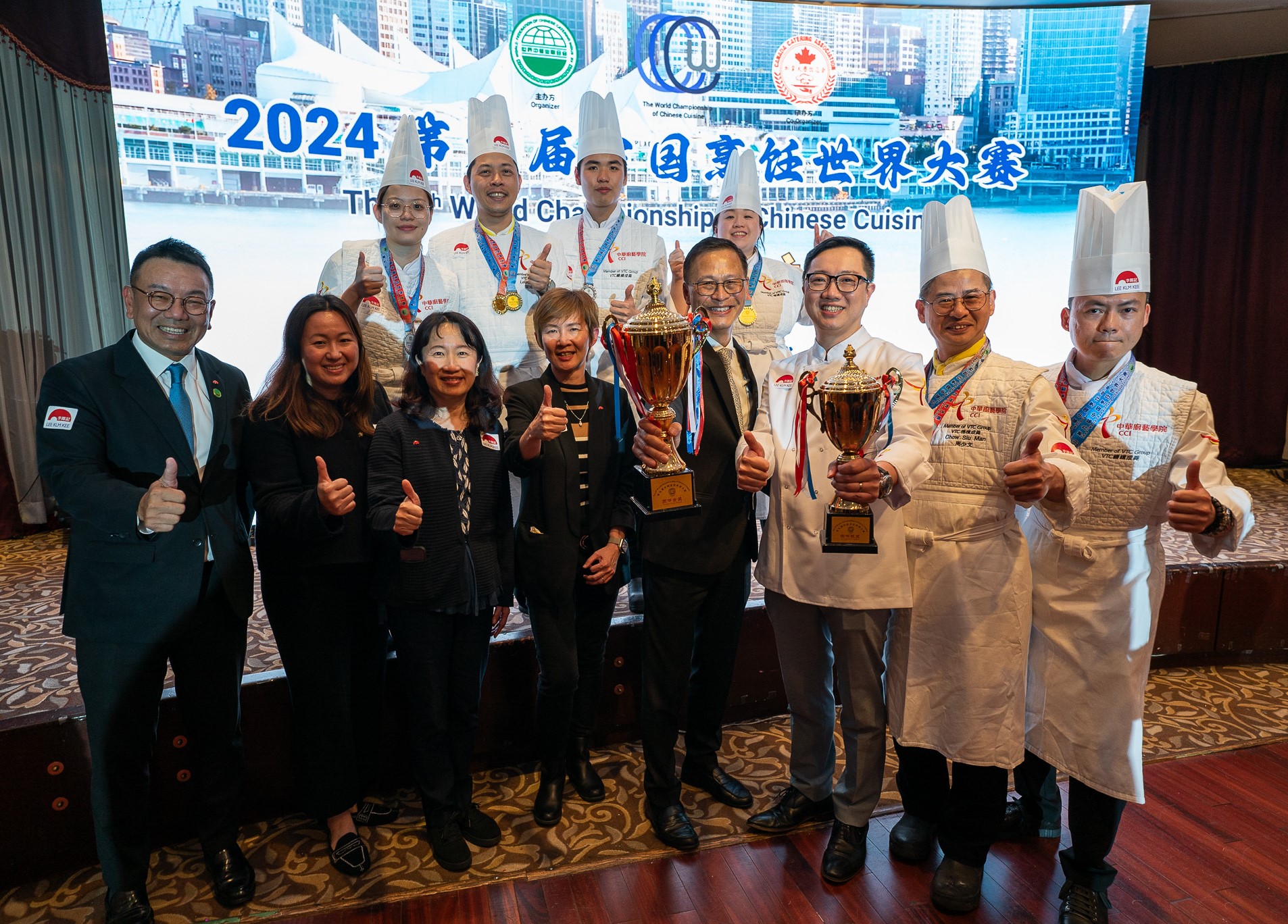 Dodie Hung, Executive Vice President – Corporate Affairs (front row, first left), Simon Wu, President – Americas of Lee Kum Kee (front row, fifth left), and Lee Kum Kee team pictured with the winning teams from the Chinese Culinary Institute of Hong Kong.